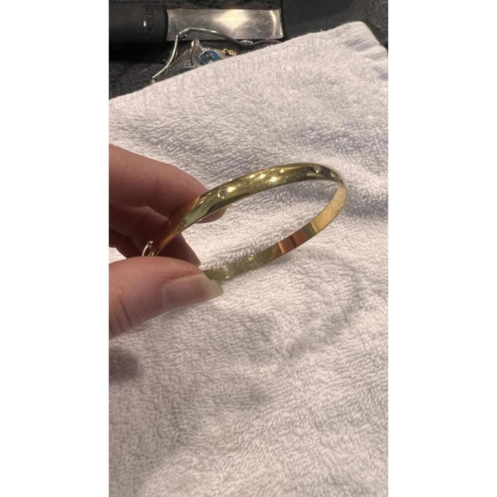 Gold Tone Bangle Bracelet with Small Embedded Stones
